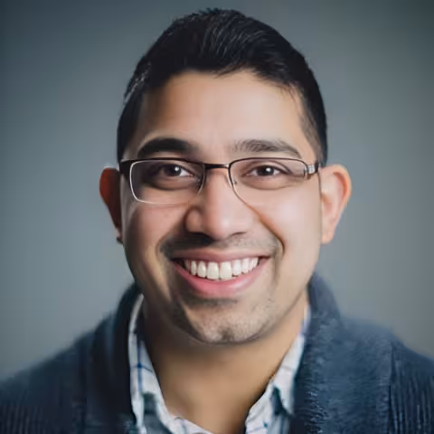 Professional headshot of Andrew Kumar